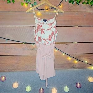Streetwear Society Romper. Floral top with light pink shorts and belt